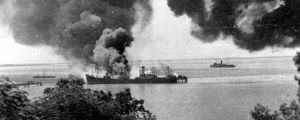 The SS Barossa burns after being bombed by the Japanese. 