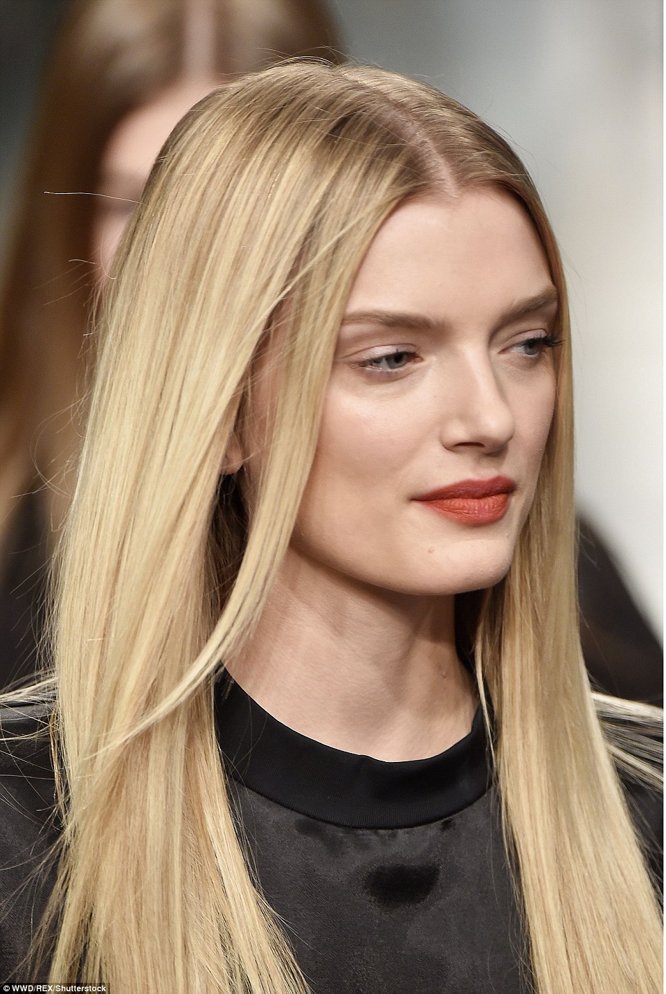 Ready for her close-up: Styling her tumbling golden locks in a severe middle parting, she subtly flaunted her features with minimal make-up