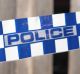 Police have charged a 46-year-old woman with murder after a five-hour siege on Saturday afternoon.