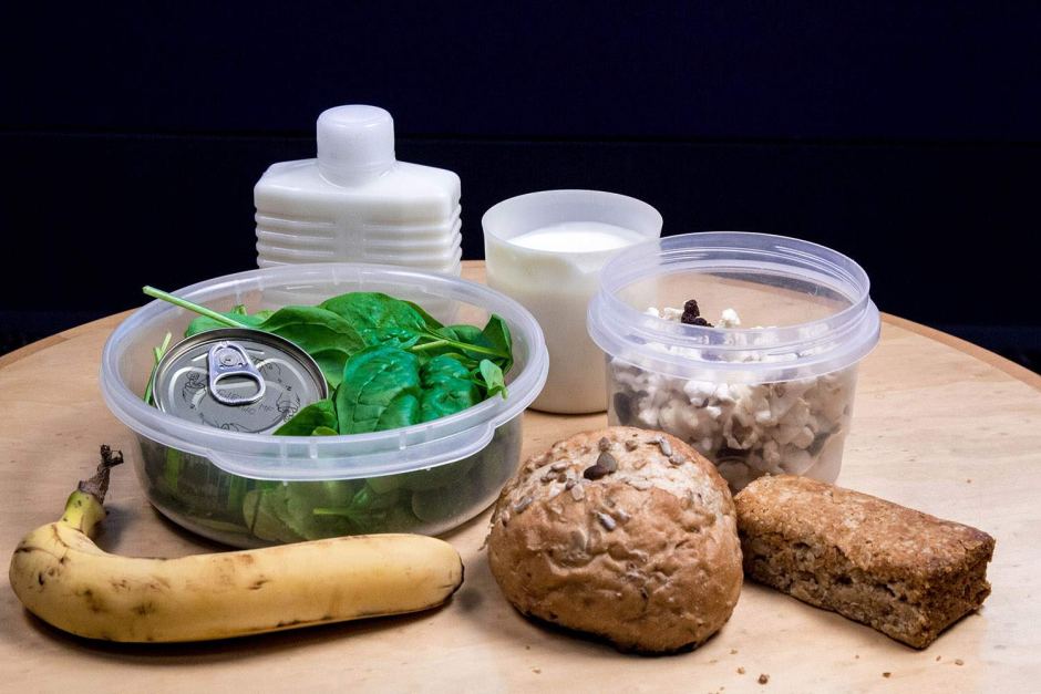 A table of food in containers