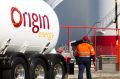 Origin Energy has sought to soften the blow from its massive writedown by raising its forecast for underlying profit.