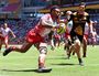 Reds player Samu Kerevi crosses to score a try during a quarter-final at the Brisbane Global Tens at Suncorp Stadium.