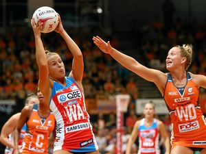 Paige Hadley of the Swifts and Jamie-Lee Price of the Giants contest possession