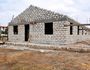 NEARLY THERE: Construction on the first house to home orphans at Umoja began in January.



Photo Contributed