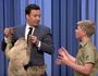 Robert Irwin introduces Tonight Show host Jimmy Fallon to a cuddly sloth.