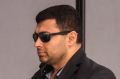 Former migration officer Chetan Mashru has been jailed for his part in an immigration fraud scheme.