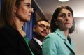NSW Premier Gladys Berejiklian, flanked by local government minister Gabrielle Upton and Deputy Premier John Barilaro at ...