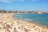 Bondi Beach is crowded with a large number of beachgoers on a hot Sunday afternoon. Bondi Beach is crowded with a large ...