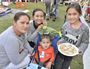 Jocelyn Balbarais of Goodna with Samantha, 12, Elijah, 18 months, and Monica, 9, enjoying the Ipswich CBD Food Fair in the Square.