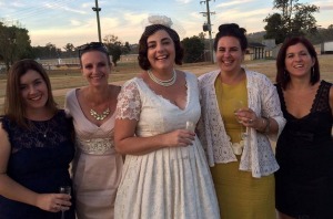 Larissa, (far left), Katie the bride, and their friendship tribe.