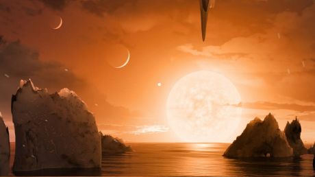 An artist's conception of the view from the fifth planet of the TRAPPIST-1 system.