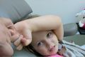 Freyja Christiansen offered a pinky promise to reassure her mum she would be a brave girl for the tests for her cancer.