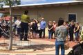 Parents gather to discuss their concerns. 