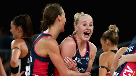 Perfect start: The Vixens celebrate their win over the Magpies on Saturday.