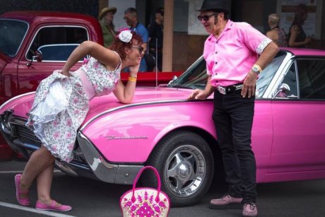 Pink couple with pink car