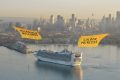 Banner-wielding helicopters welcome the Golden Princess to Melbourne.