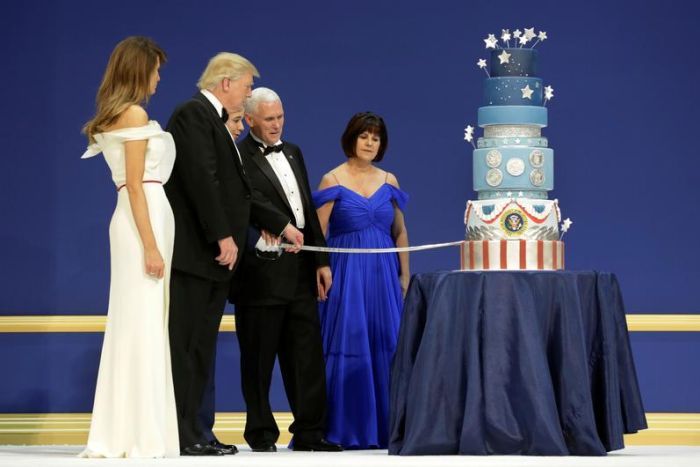 President Trump and first lady Melania cut cake at inaugural ball