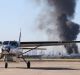 A plume of smoke from the crash at Essendon Airport on Tuesday. 