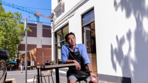 Two Birds Cafe owner Justin Lan says opening on weekends is hard for small business owners. 