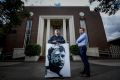 Dominik Kul (right) and Sean Burton outside the defence building at 310 St Kilda Road that the defence department is selling.