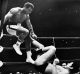 The original Farce of the Century: Muhammad Ali tries to evade the kicks of Antonio Inoki during their martial arts ...