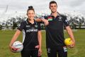 Collingwood AFL captain Scott Pendlebury and Collingwood netball captain Madi Robinson on Tuesday. 