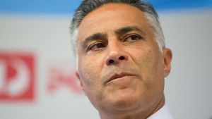 Australia Post chief Ahmed Fahour  announces the half-year result of $197 million profit. 