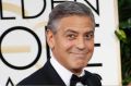 Actor George Clooney and his wife Amal Clooney arrive at the 72nd Golden Globe Awards in Beverly Hills, California ...