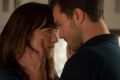 Dakota Johnson and Jamie Dornan in <i>Fifty Shades Darker</i>.