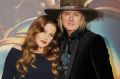Lisa Marie Presley (left) and Michael Lockwood arrive at the <i>Mad Max: Fury Road</i> Los Angeles Premiere at in May 2015.