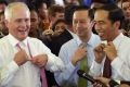 Prime Minister Malcolm Turnbull and Indonesian President Joko Widodo go walkabout  in Jakarta in November 2015. Between ...