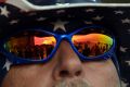 Air Force One is reflected in a pair of sunglasses as President Donald Trump arrives to speak at his "Make America Great ...