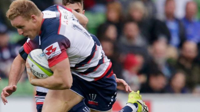 MELBOURNE, AUSTRALIA - MAY 29: Reece Hodge of the Rebels runs with the ball during the round 14 Super Rugby match ...