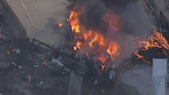 Aerial footage shows the plane crash site at a shopping centre near Essendon Airport (Courtesy Channel 9)