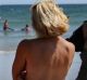 Women go topless on Hampton Beach, New Hampshire, for GoTopless Day in August. The US national day promotes gender ...