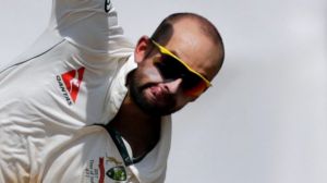 Australia's Nathan Lyon bowls during a practice match against India A in Mumbai, India, Saturday, Feb. 18, 2017. (AP ...