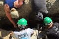 Students carry out excavation of a Transylvanian cemetery in Romania. 