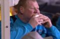 Tucking in: Wayne Shaw eats a pie in the dug-out during the game.