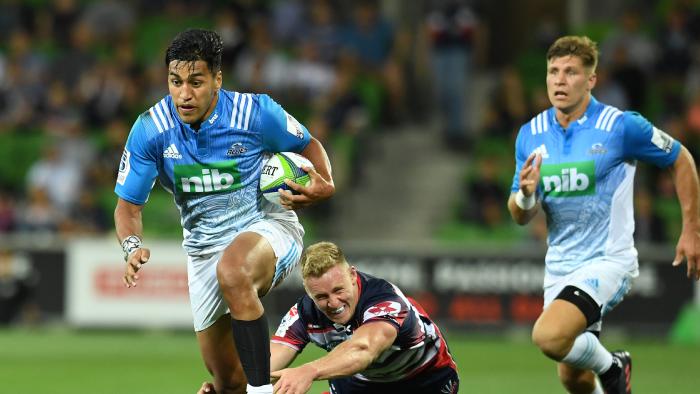 Rieko Ioane of the Blues avoids a tackle to score a try during the round 1 Super Rugby match between the Melbourne Rebels and the Blues at AAMI Park in Melbourne, Thursday, Feb. 23, 2017. (AAP Image/Tracey Nearmy) NO ARCHIVING, EDITORIAL USE ONLY