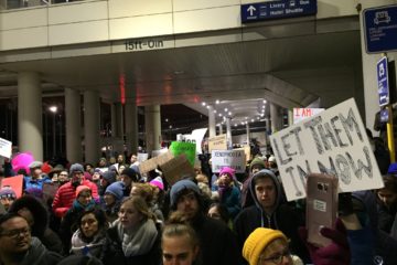 Protesters speak out against Trump's Muslim ban at O'Hare International Airport in Chicago, IL. Photo by Kevin Gosztola.