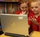 School children work off a computer at Darlington Public School. 