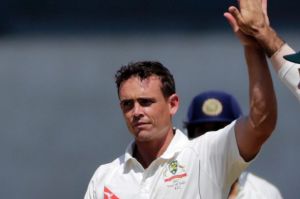 Australia's Steve O'Keefe, left, celebrates after Shahbaz Nadeem's wicket during practice match against India A in ...