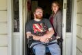 Shane Barnbrook, with wife Sarah, is suing two hospitals for negligent care that left him a quadriplegic.