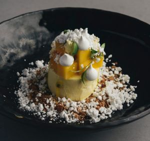 Mango mousse with coconut, passionfruit and white chocolate.