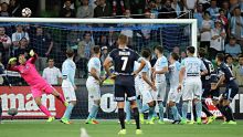 MELBOURNE, AUSTRALIA - FEBRUARY 24:  Brandon O'Neill (R) of Sydney FC scores their second goal during the round 21 ...