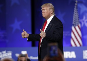 President Donald Trump gestures after speaking at the Conservative Political Action Conference (CPAC), Friday, Feb. 24, 2017, in Oxon Hill, Md.