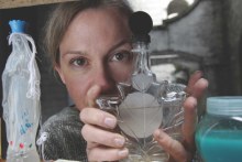 Amy Sharrocks holds one of her samples. (Supplied: Ruth Corney)