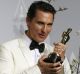 Matthew McConaughey with his 2014 Best Actor Oscar for <i>Dallas Buyers Club</i>.