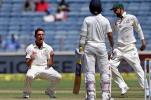 Steve O'Keefe celebrates the dismissal of Ajinkya Rahane.