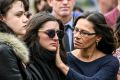 Mourners on Friday at a memorial for victims of the Essendon Airport plane crash. 